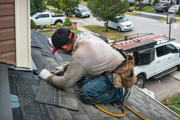 Professional Gutter Installation technician working in Salem, OR